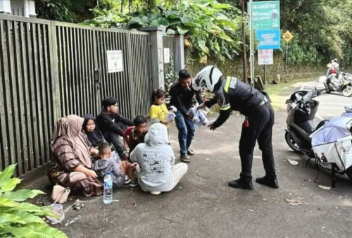 Upaya Satlantas Polres Bogor Jaga Kondusivitas Jalur Puncak Lewat Program Motor Senyum